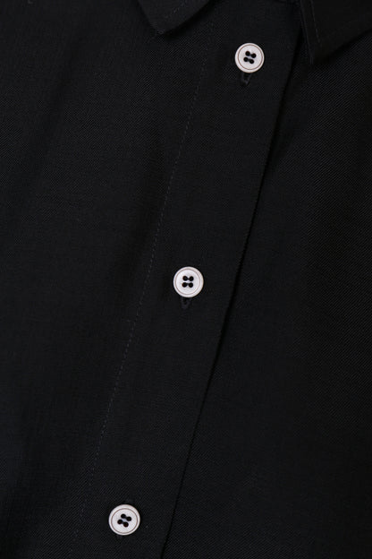 Close-up of the Japanese viscose fabric and white contrast buttons on the YIBRI Black Button-Up Shirt.