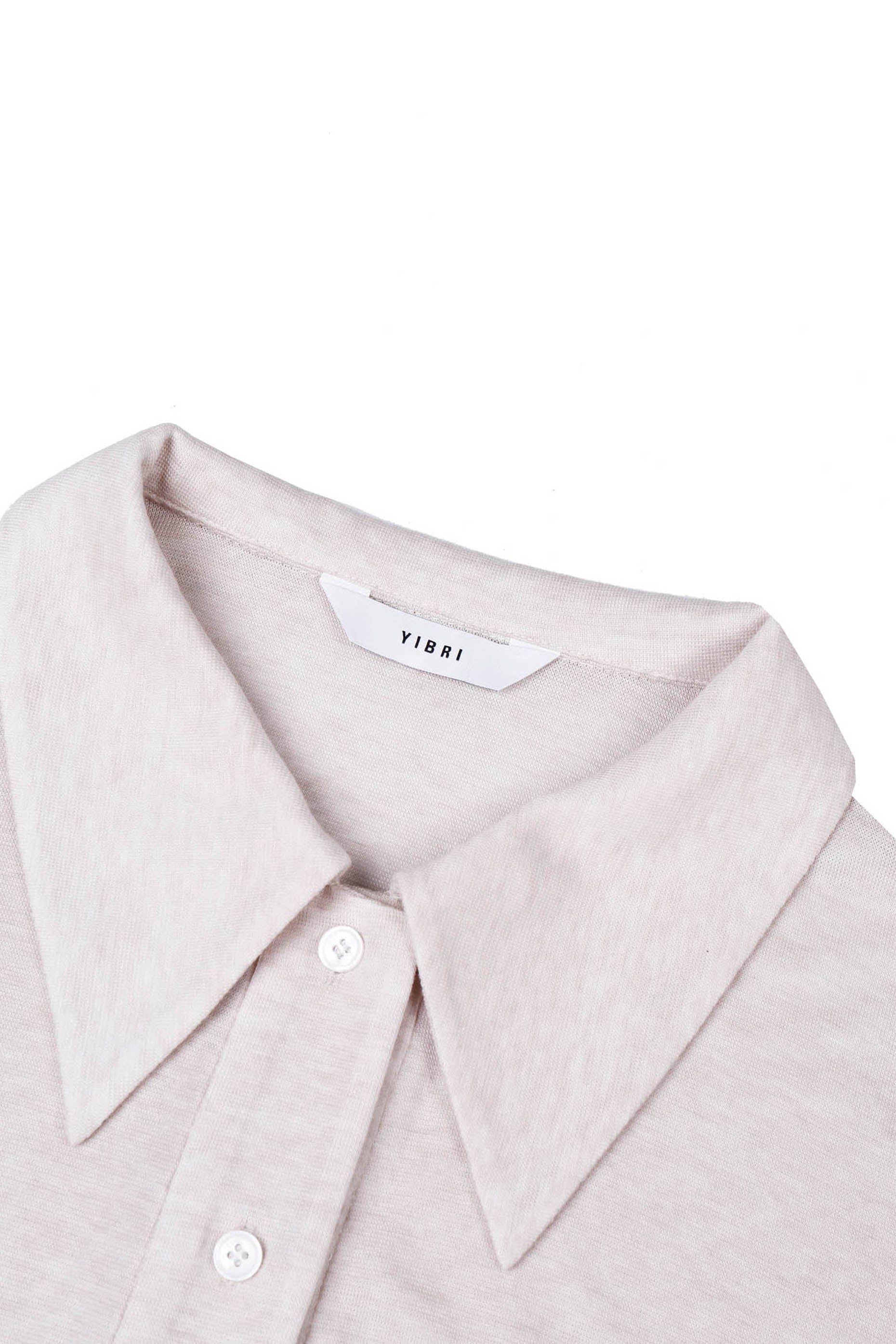 Close-up of the pointed collar on the YIBRI Fitted Jersey Shirt, showing the soft heathered jersey fabric and refined construction.