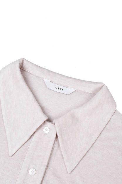 Close-up of the pointed collar on the YIBRI Fitted Jersey Shirt, showing the soft heathered jersey fabric and refined construction.
