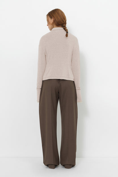 Back view of model wearing the YIBRI Fitted Jersey Shirt, showing streamlined fit and natural jersey stretch.