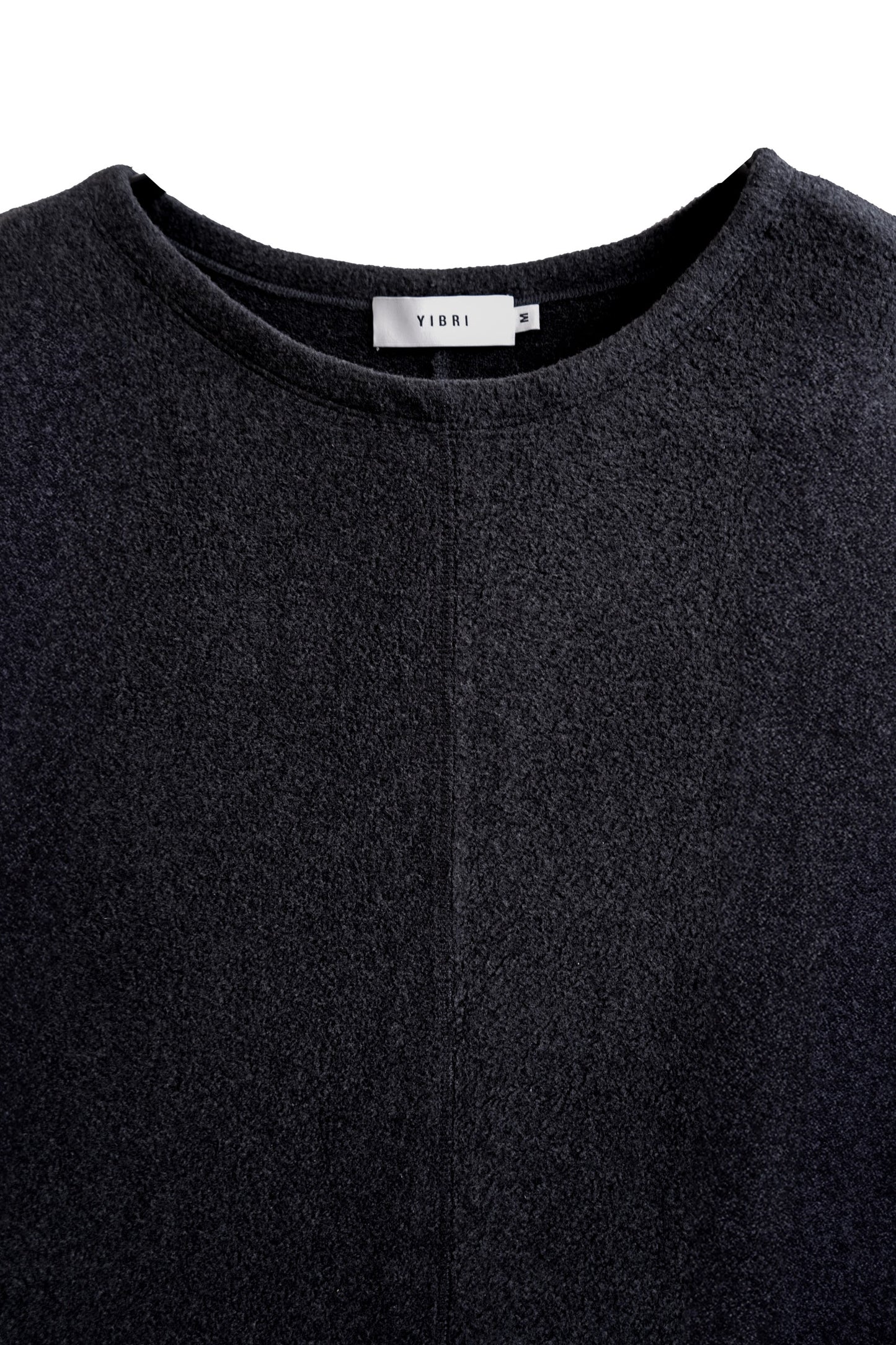 Close-up of the neckline on the YIBRI Fleece Oversized Roll-Sleeve Top, highlighting the soft fleece surface and minimalist finishing.