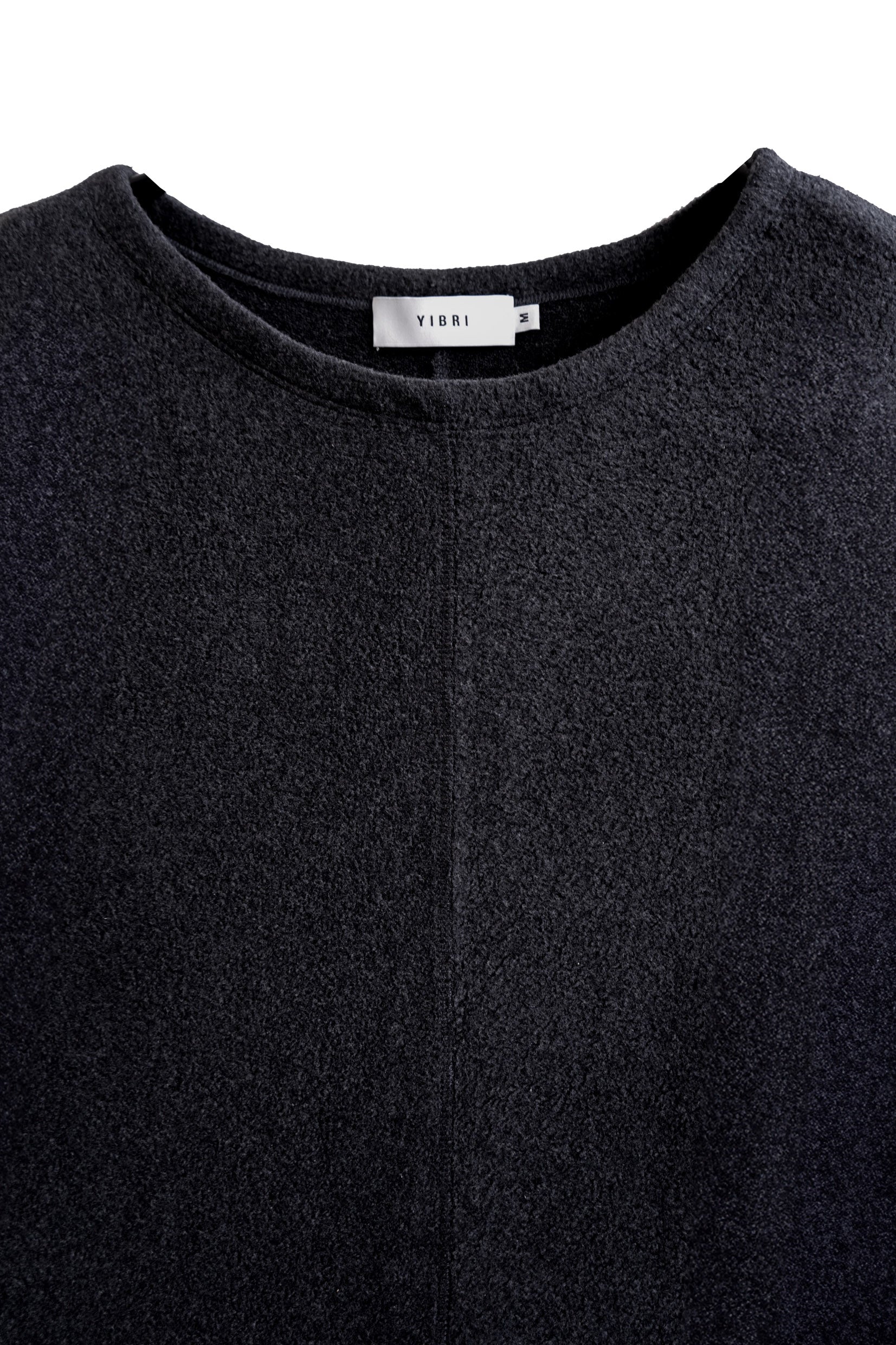 Close-up of the neckline on the YIBRI Fleece Oversized Roll-Sleeve Top, highlighting the soft fleece surface and minimalist finishing.