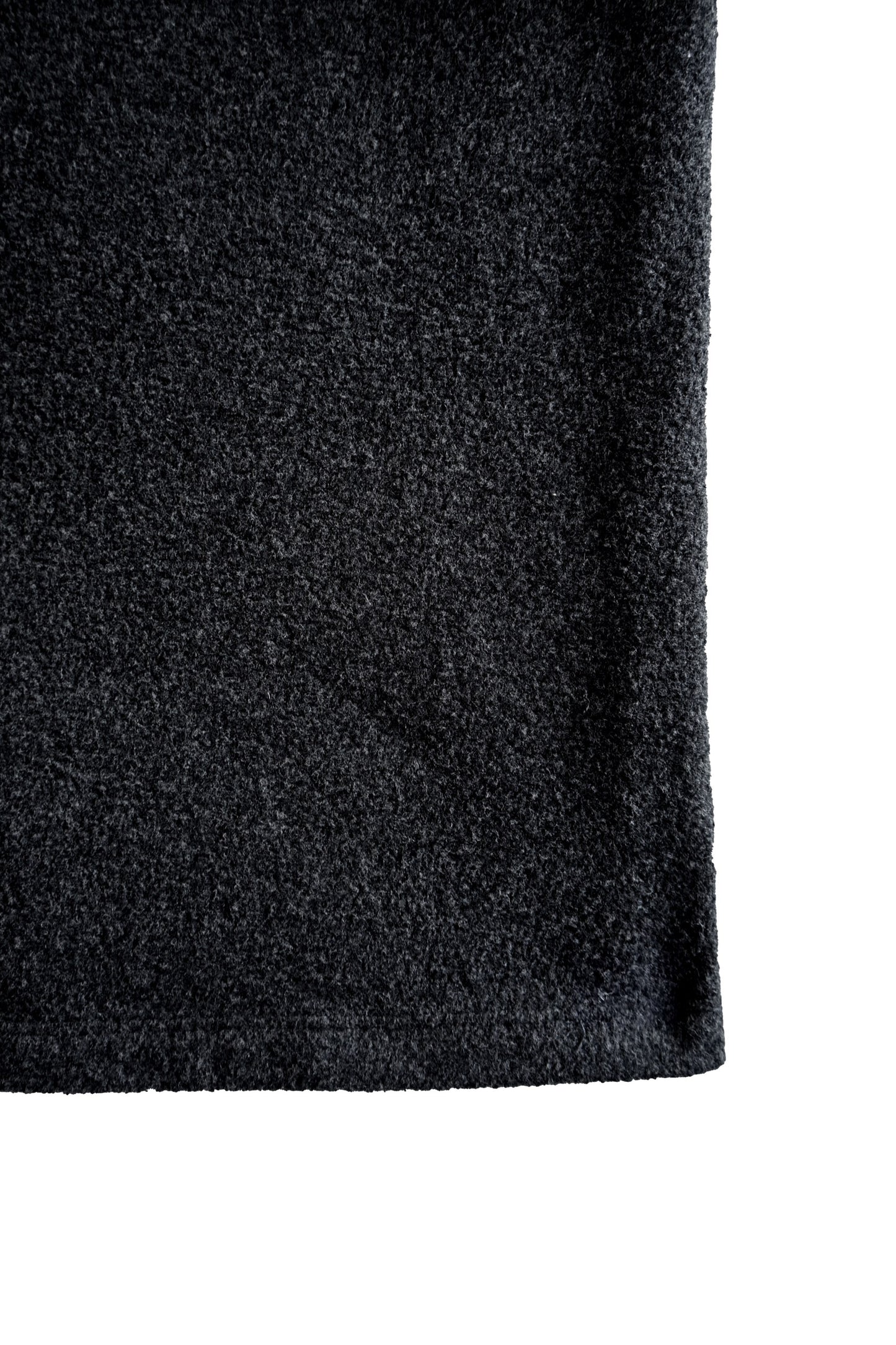 Texture close-up of the YIBRI Fleece Oversized Roll-Sleeve Top in charcoal, showcasing the dense, soft brushed fleece.