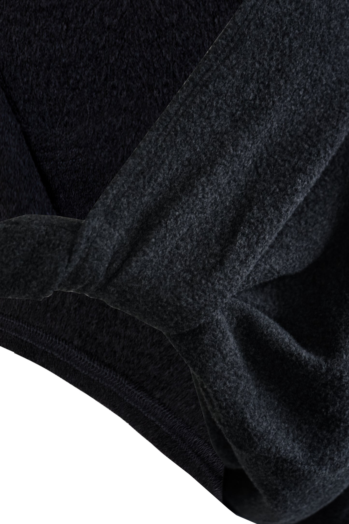 Close-up of the twist detail on the YIBRI Fleece Reversible Twisted Top, highlighting the soft fleece texture and gathered construction.