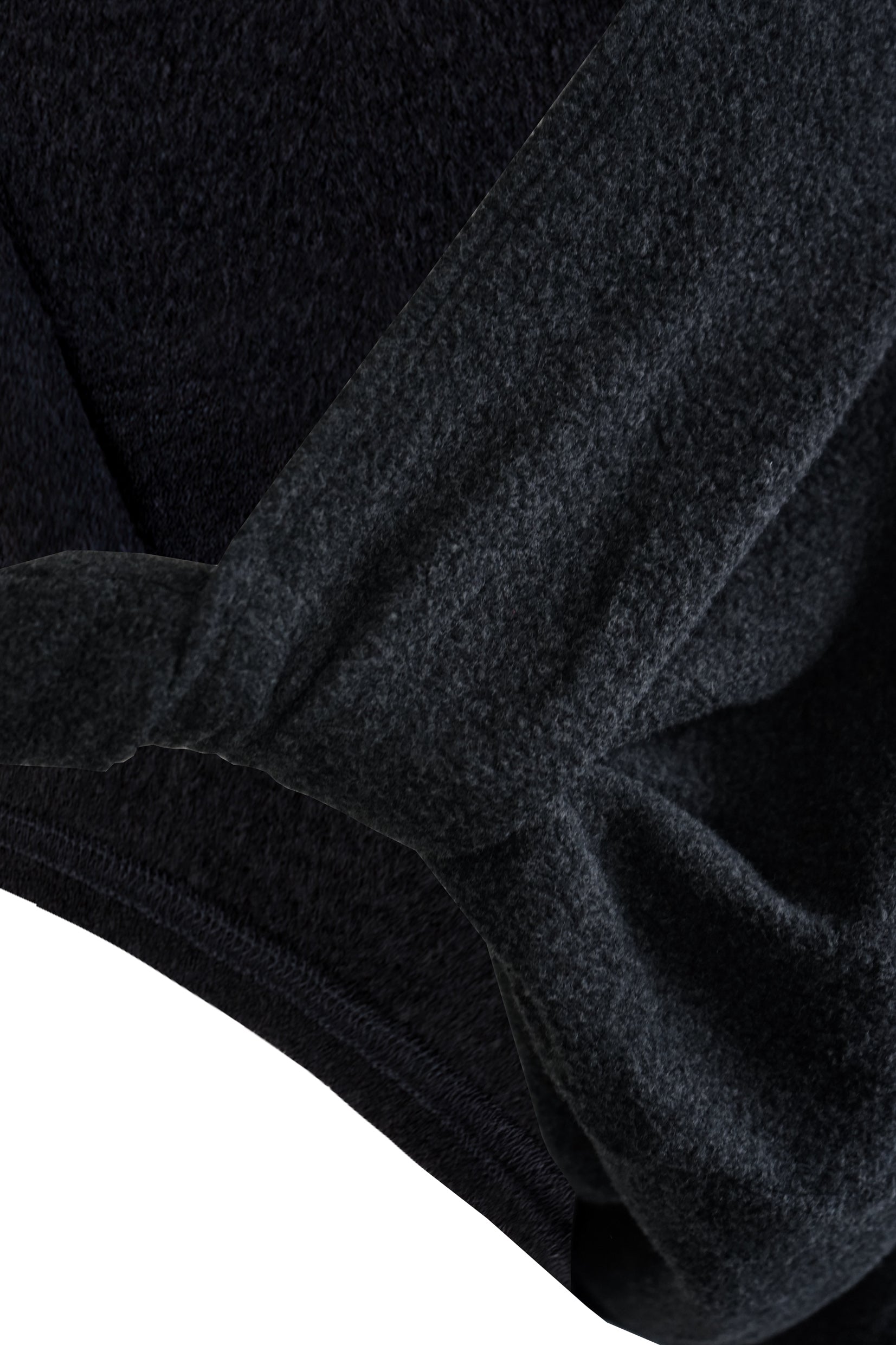 Close-up of the twist detail on the YIBRI Fleece Reversible Twisted Top, highlighting the soft fleece texture and gathered construction.