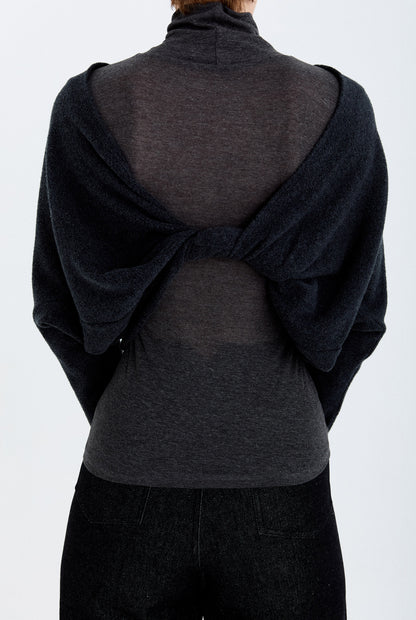 Close-up back detail of the YIBRI Fleece Reversible Twisted Top, showing the twisted construction and soft fleece texture when worn reversed.