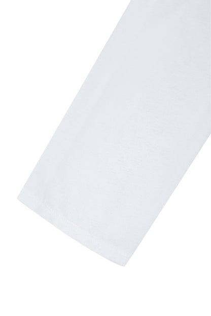 Detail of the sleeve hem on the YIBRI Reversible Cropped Cardigan showing clean finishing and lightweight jersey fabric.