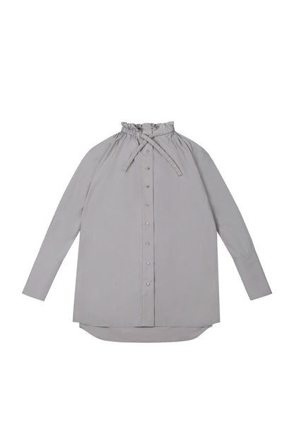 Front view of YIBRI Ruched Collar Long Shirt in soft grey featuring gathered neckline, button-down front and extended cuffs — a quiet luxury oversized shirt silhouette.
