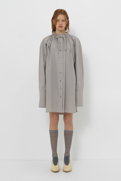 Model wearing YIBRI Ruched Collar Long Shirt in grey with oversized silhouette, gathered neckline and long cuffs — understated quiet luxury styling.