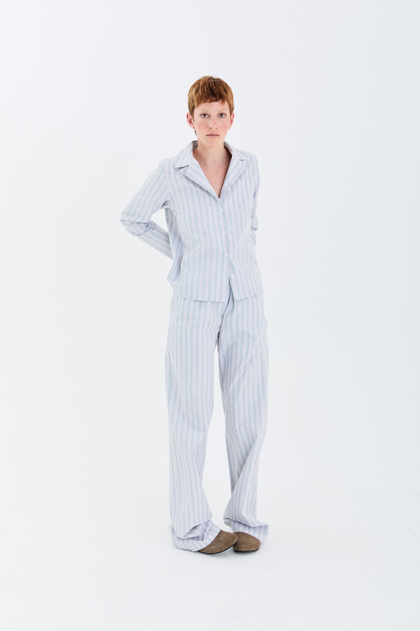 Model front pose in the YIBRI Stonewashed Striped Shirt showing the open collar and soft drape of the stonewashed cotton.