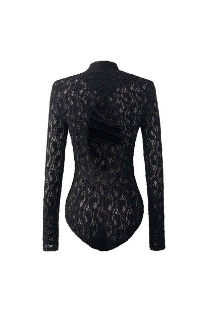 Back view of YIBRI Reversible Twisted-Knot Top in black lace, showing the dramatic open cut-out back and overlapping twist construction.