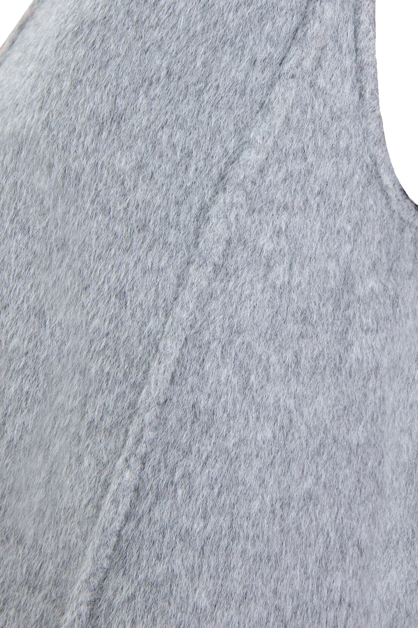 Close-up of a gray tank top sleeveless garment, long hair double face wool