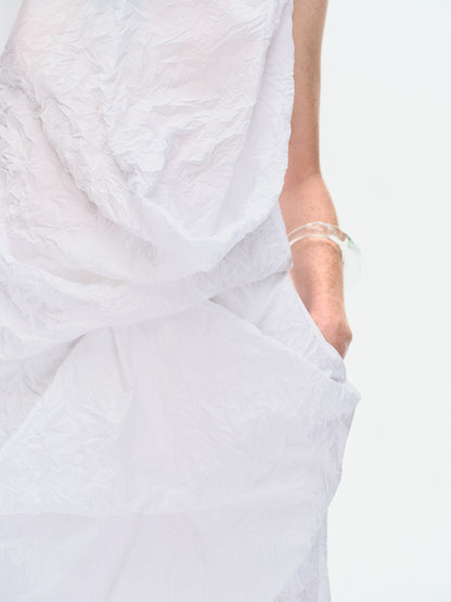 Close-up of the draped front panel on the YIBRI White Crinkled Texture Sleeveless Top, highlighting the dimensional crushed texture and sculpted softness.