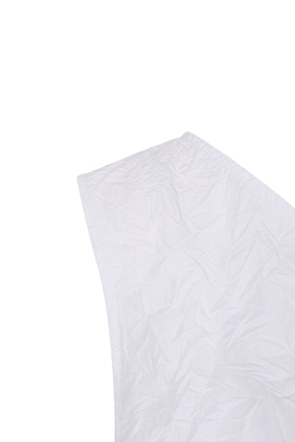 Close-up of crinkle texture on YIBRI White Sculpted Crinkle Mini Dress highlighting sculptural detailing and refined quiet luxury craftsmanship