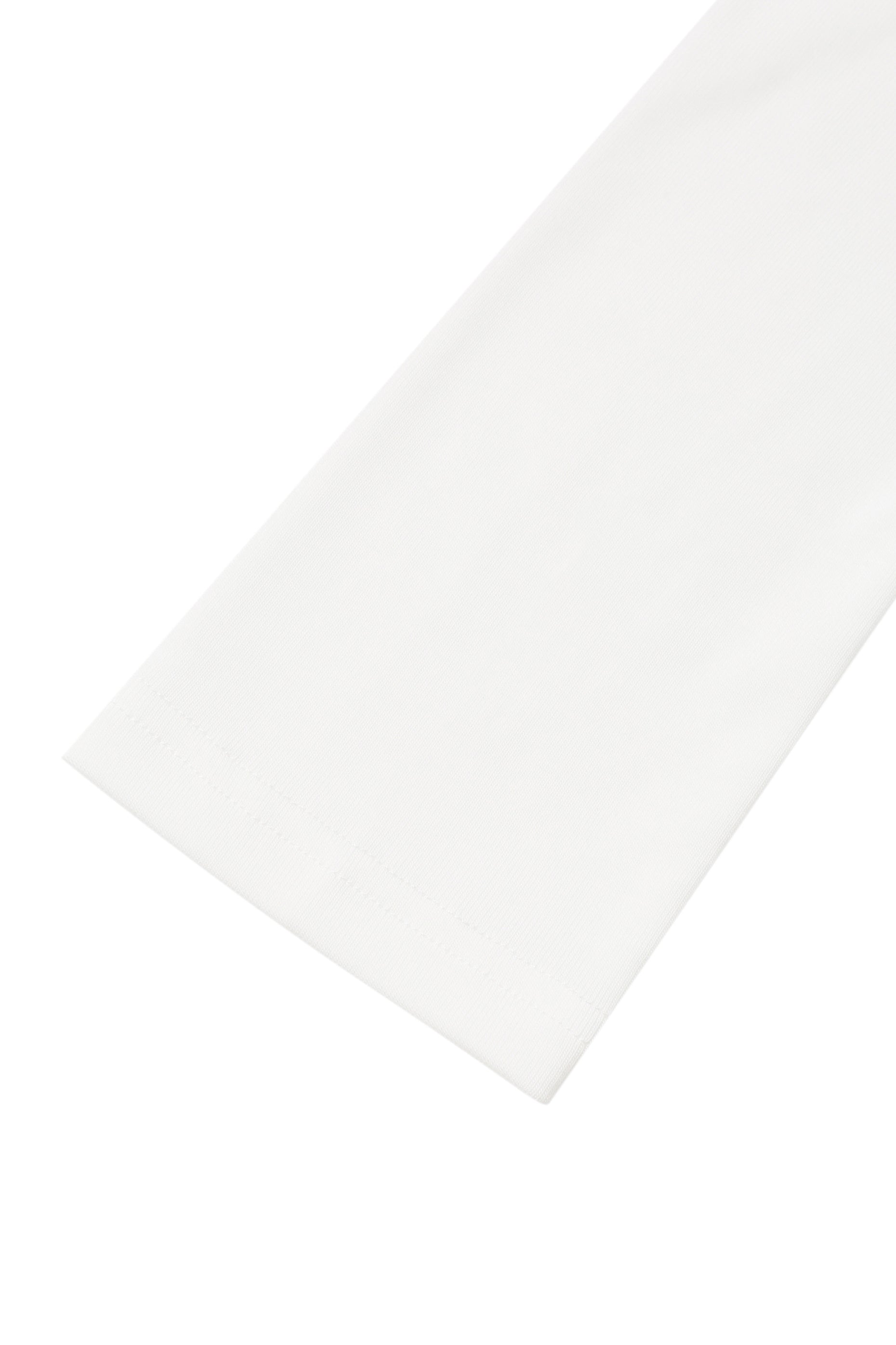 Detail view of the sleeve hem on the YIBRI White Twisted Long Jersey Sleeve Top, showing the soft jersey texture and refined finishing.