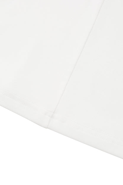 Close-up of the hem on the YIBRI White Twisted Long Jersey Sleeve Top, highlighting the fine jersey stitching and subtle ivory tone.