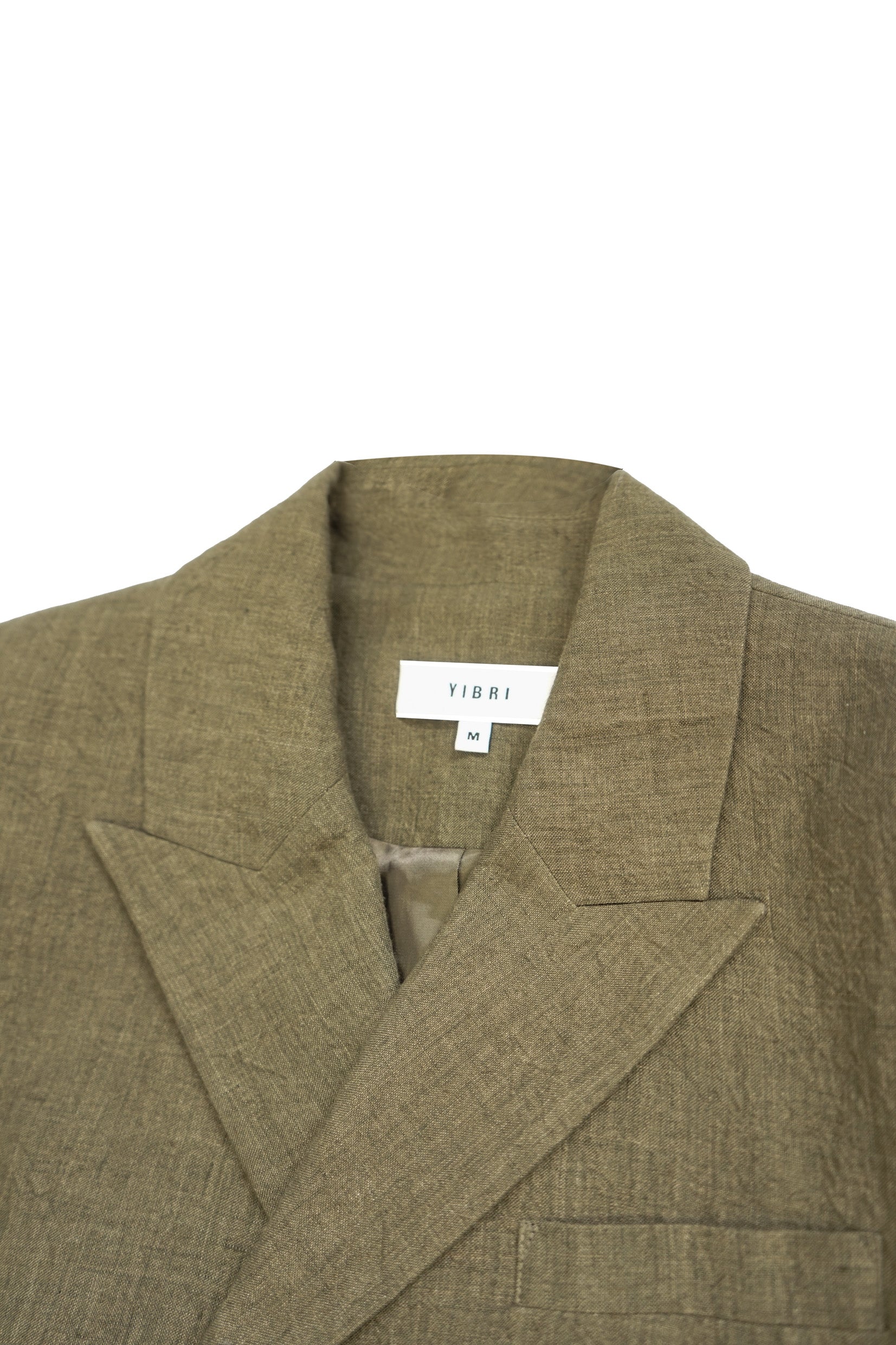 Close-up of the lapel and collar on the YIBRI Yarn-Dyed Linen Double-Breasted Blazer, highlighting clean tailoring and natural linen grain.