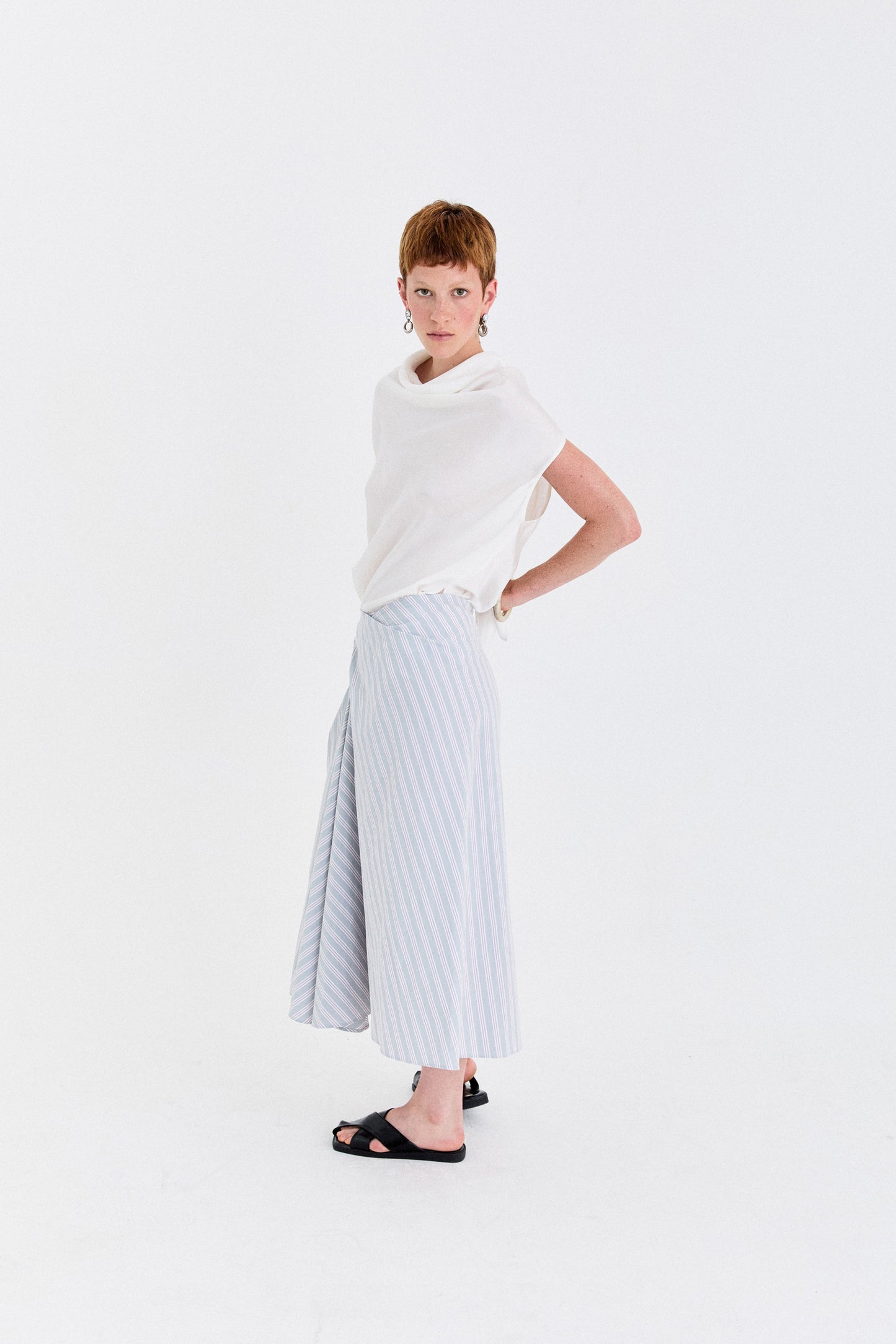 STONEWASHED COTTON TWILL TWISTED-PLEAT MIDI SKIRT