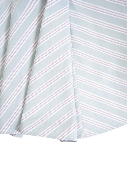 STONEWASHED COTTON TWILL TWISTED-PLEAT MIDI SKIRT